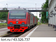 Дизель-электропоезд ДТ1-006/004 на станции Псков-Пассажирский (2018 год). Редакционное фото, фотограф Алексей Иванов / Фотобанк Лори