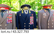 Vintage uniform of Admiral of the Fleet of the Soviet Union S. Gorshkov and other military leaders with various awards, orders and medals (2024 год). Редакционное фото, фотограф FotograFF / Фотобанк Лори