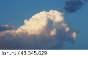 Beautiful yellow clouds in sky. Volumetric light effect. Sunrays are hidden behind approaching dark clouds. Cumulus convection in troposphere. Cumulonimbus vertical developed. Sunset and sunrays. Стоковое видео, видеограф Юлия Петровская / Фотобанк Лори