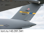BERLIN - JUNE 05, 2024: The strategic and tactical airlifter McDonnell Douglas/Boeing C-17 Globemaster III. US Air Force. ILA Berlin Air Show 2024. Редакционное фото, фотограф Sergey Kohl / Фотобанк Лори