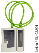 Тестер сетевых кабелей и кабель на белом фоне. Network tester on white background. Стоковое фото, фотограф Татьяна Д / Фотобанк Лори