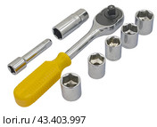 Гаечный ключ с храповым механизмом и прорезиненной ручкой с шестигранным гнездом. Ratchet wrench with rubberized handle with hexagonal socket. Стоковое фото, фотограф Татьяна Д / Фотобанк Лори
