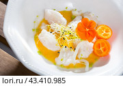 Ceviche from hake with spicy avocado sauce and cumquat at plate. Стоковое фото, фотограф Яков Филимонов / Фотобанк Лори