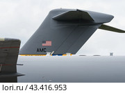 BERLIN - JUNE 05, 2024: The fragment of strategic and tactical airlifter McDonnell Douglas-Boeing C-17 Globemaster III. US Air Force. ILA Berlin Air Show 2024. Редакционное фото, фотограф Sergey Kohl / Фотобанк Лори