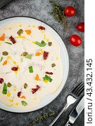 yogurt with additions of syrup, dried fruits and pieces of nuts, top view. Стоковое фото, фотограф Abakumova Ekaterina / Фотобанк Лори