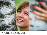 Beautiful woman with an emotional expression on the background of birches, embodying harmony with nature. Стоковое фото, фотограф Юрий Поздников / Фотобанк Лори
