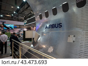 BERLIN - JUNE 06, 2024: A fragment of the aluminum fuselage skin of an Airbus aircraft. ILA Berlin Air Show 2024. Редакционное фото, фотограф Sergey Kohl / Фотобанк Лори
