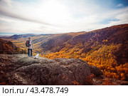 Middle Aged Woman with backpack walking in the autumn forest trip. Стоковое фото, фотограф Гладских Татьяна / Фотобанк Лори