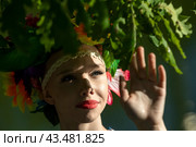 Девушка принимает участие в праздновании белорусского праздника "Купалье" в парке "Останкино" города Москвы, Россия (2024 год). Редакционное фото, фотограф Николай Винокуров / Фотобанк Лори