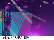 Futuristic bright lights on the stage. Lighting of stage spotlight. Natural high tech background. Photography is suitable for postcard design, greeting card. Стоковое фото, фотограф YuryKara / Фотобанк Лори