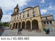 Bilbao, Spain - June 10, 2019: San Nikolas Eliza church. Exterior baroque architecture in Basque country. Lifestyles of the capital of Basque country in summer sunny day. Редакционное фото, фотограф YuryKara / Фотобанк Лори