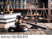 Justice and the law. A wooden hammer, books and scales on the table. The court session. Стоковое AI-изображение, AI-художник Photojuli / Фотобанк Лори