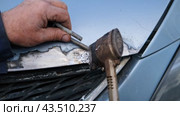 Car body shop. Repair man processes the welding seam using an angle grinder on replaced car part. Professional Body master grind old paint and rust. Rust damage. Rusting car. Hands with tool close-up. Стоковое видео, видеограф Марина Демидюк / Фотобанк Лори
