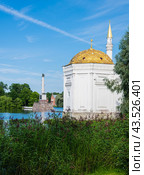 Turkish bath and Chesme Column in Catherine Park with reflection in the wate, Tsarskoe Selo, Pushkin, St. Petersburg, Russia. (2024 год). Стоковое фото, фотограф Михаил Аккуратoв / Фотобанк Лори