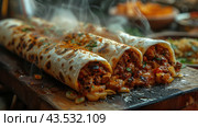 Shawarma, gyro, fresh roll of lavash, doner kebab with steam. Beef, pickled cucumber, carrot. Served on wooden plate. Traditional Eastern oriental snack, street food menu. Стоковое AI-изображение, AI-художник Ирина Михайличенко / Фотобанк Лори