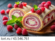 Swiss sponge roll with raspberries, a delicious fruit and cream dessert filled with cream cheese, decorated with fresh raspberries. Стоковое AI-изображение, AI-художник Photojuli / Фотобанк Лори