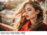 A beautiful, young woman with a thoughtful look. The hair develops in the wind and gives a feeling of lightness and naturalness. Стоковое AI-изображение, AI-художник Photojuli / Фотобанк Лори