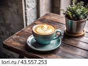A seasonal drink. Delicious hot cappuccino in a mug with a saucer and a knitted snood, a scarf on a wooden table in the interior of the cafe. It's a rainy autumn day. Стоковое AI-изображение, AI-художник Photojuli / Фотобанк Лори