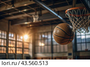 A basketball is flying into the ring on the basketball court. A goal. The ball is in close-up. Стоковое AI-изображение, AI-художник Photojuli / Фотобанк Лори