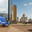 Saransk, Mordovia, Russia, 06.04.2023. A blue car with the inscription Russian Post and a double-headed Russian eagle against the background of the post office of the central street of Saransk. Редакционное фото, фотограф Оксана Медведева / Фотобанк Лори