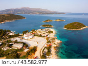 Drone view of Albanian resort of Ksamil on coast of Ionian sea. Стоковое фото, фотограф Яков Филимонов / Фотобанк Лори