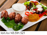 Image of kebets with vegetables in plate. Стоковое фото, фотограф Яков Филимонов / Фотобанк Лори