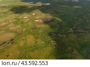 Arctic tundra in summer from an altitude of 2000 meters. Variety of colors and landscapes. The vastness of pristine nature. Shadow from clouds. Стоковое фото, фотограф Владимир Ендовицкий / Фотобанк Лори