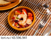 Popular Spanish appetizer, seafood salpicon, is served on plate. Стоковое фото, фотограф Яков Филимонов / Фотобанк Лори