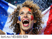 A beautiful athlete or cheerleader from France with joyful shouts after winning the competition at the Olympic Games against the background of the French flag. Стоковое AI-изображение, AI-художник Photojuli / Фотобанк Лори