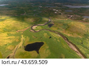 Arctic tundra in summer from an altitude of 2000 meters. Variety of colors and landscapes. The vastness of pristine nature. Shadow from clouds. Стоковое фото, фотограф Владимир Ендовицкий / Фотобанк Лори