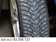 winter tire car with shallow depth of field. Стоковое фото, фотограф Володина Ольга / Фотобанк Лори