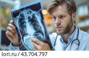 A doctor carefully reviews an xray image of a patients chest for any signs of abnormalities. Стоковое AI-изображение, AI-художник Юрий Поздников / Фотобанк Лори