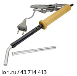 Электрический паяльник с деревянной ручкой на белом фоне. Electric soldering iron isolated on a white background. Стоковое фото, фотограф Татьяна Д / Фотобанк Лори