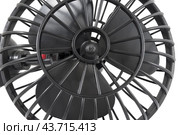 Портативный настольный черный вентилятор на белом фоне. Portable black fan on a white background. Стоковое фото, фотограф Татьяна Д / Фотобанк Лори