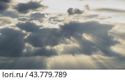 Sunrays shine through the clouds- God concept. Стоковое видео, видеограф Илья Шаматура / Фотобанк Лори