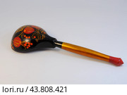 Русские народные промыслы. Хохлома. Деревянная ложка крупным планом. Редакционное фото, фотограф Татьяна Костенко / Фотобанк Лори