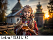 The concept of the Russian Orthodox holiday Honey Savior. A beautiful little girl in Russian national clothes and a scarf with a jar of honey on the background of an Orthodox church. Стоковое AI-изображение, AI-художник Photojuli / Фотобанк Лори