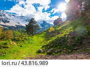 Beautiful view of the mountain nature against the background of the snowy peak of the Elbrus region in sunny weather. The highlanders of the North Caucasus. Russia. Стоковое фото, фотограф Константин Лабунский / Фотобанк Лори