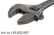 Разводной гаечный ключ на белом фоне. An adjustable wrench on a white background. Стоковое фото, фотограф Татьяна Д / Фотобанк Лори