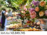 Caterers arranging dishes for a garden party with guests in background. Стоковое AI-изображение, AI-художник Иван Рябоконь / Фотобанк Лори