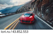 A bright red car in the mountains, conquering a winding road with a magnificent view. Стоковое AI-видео, аниматор Юрий Поздников / Фотобанк Лори