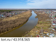 Aerial view of the Inya River and the village of Baryshevo in Russia in spring. Стоковое фото, фотограф Сергей Фролов / Фотобанк Лори