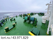 Board of lng tanker sailing in ocean. Types of tankship include oil tanker, chemical tanker, gas carrier. Стоковое фото, фотограф Ирина Старикова / Фотобанк Лори