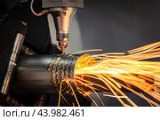 CNC Laser cutting of metal, modern industrial technology. Стоковое фото, фотограф Андрей Армягов / Фотобанк Лори