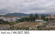 Панорама города Кэсон в Северной Корее. Пасмурный летний день. (2024 год). Стоковое фото, фотограф Александр Кузнецов / Фотобанк Лори