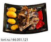 Fried fatty and juicy lamb and vegetable side dish of potato and bell pepper. Стоковое фото, фотограф Яков Филимонов / Фотобанк Лори