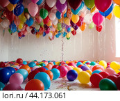 The bright room is filled with lots of colorful balloons for the holiday. Стоковое AI-изображение, AI-художник Ольга Пахомова / Фотобанк Лори