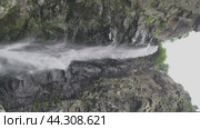 Magnificent falls with a torrent of bracingly cool water on an overcast day. Стоковое видео, видеограф Strunov David / Фотобанк Лори