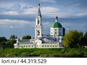 City Tver landscape view at sunny spring or summer day and river Volga embankment and Catherine's convent, green trees and cloudy sky. Spring Tver travel banner of tourism concept. Tver city, Russia. Стоковое фото, фотограф Евгений / Фотобанк Лори