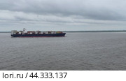 Germany - April 04 2024 Transportation of containerized cargo by sea. Редакционное видео, видеограф Ирина Старикова / Фотобанк Лори